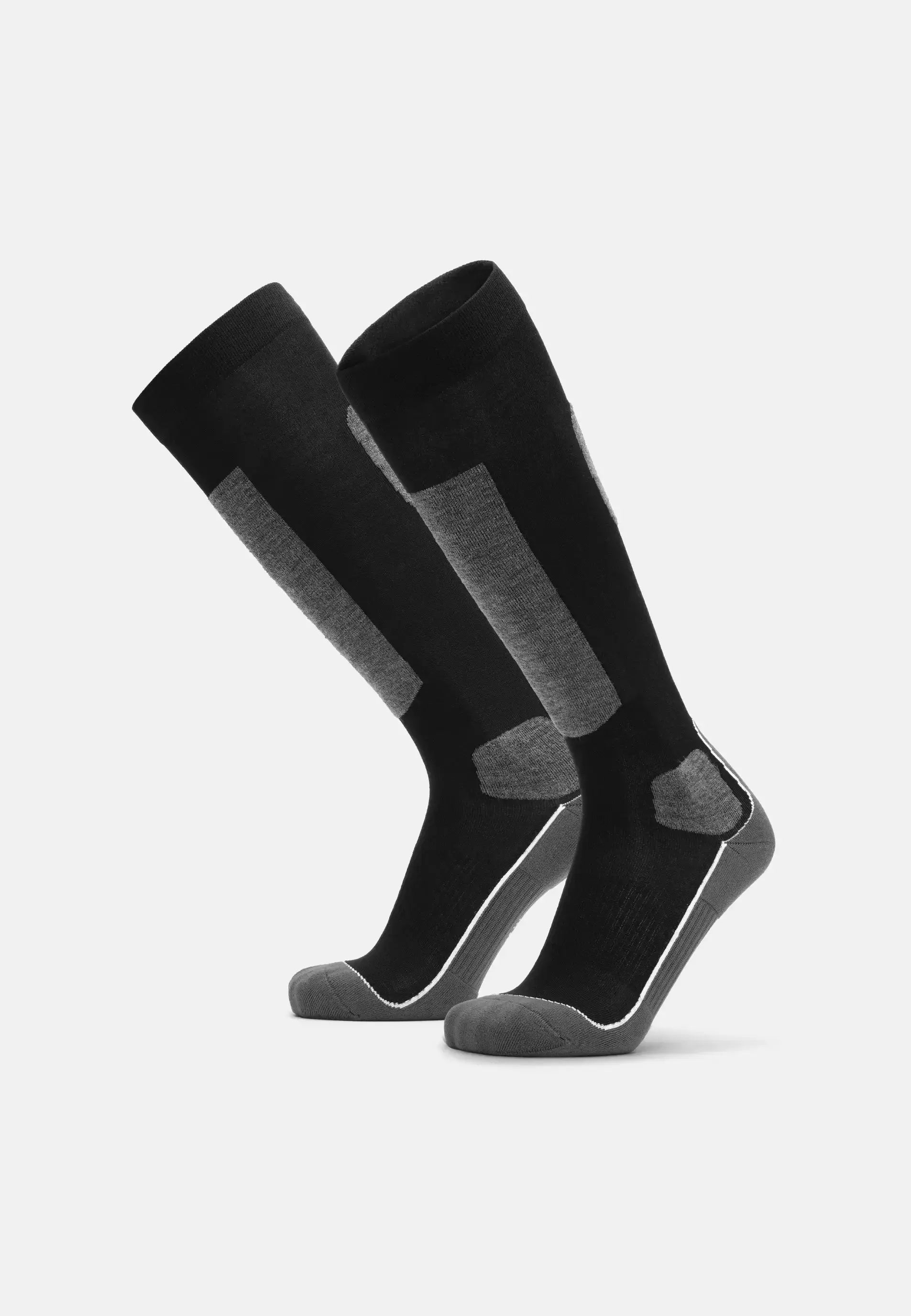 Black and gray knee-high ski socks with cushioned heels and toes.