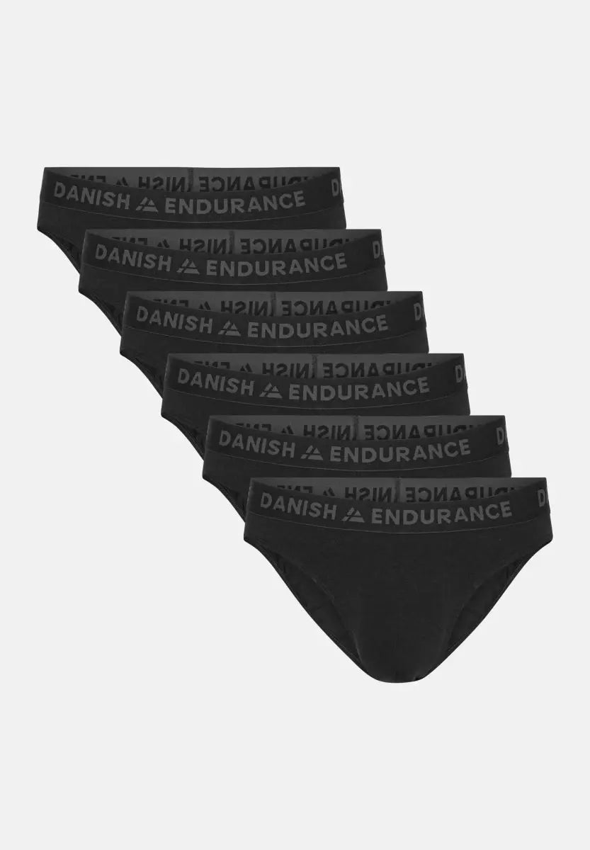 Six black briefs with "Danish Endurance" waistband, stacked in a fan-like arrangement.