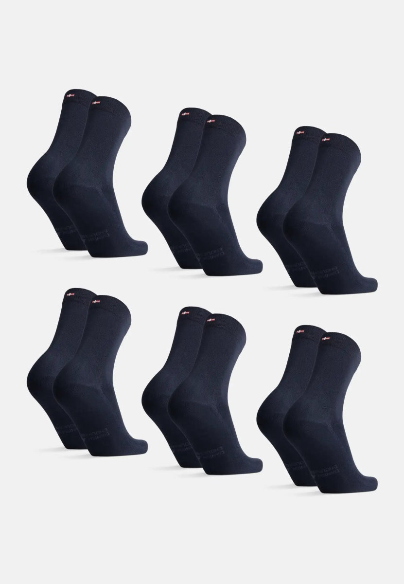 Six pairs of dark blue bamboo dress socks arranged in two rows on a white background.