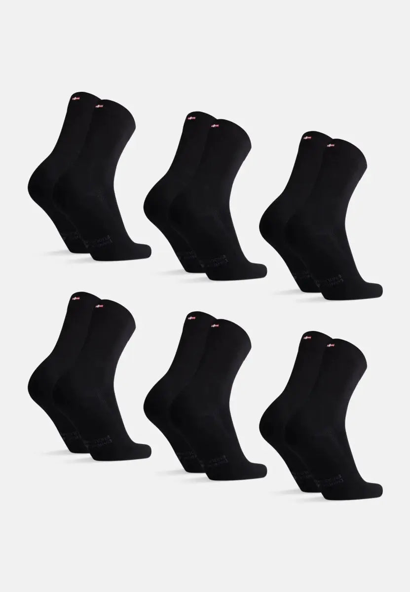 Six pairs of black bamboo dress socks, neatly arranged in two rows on a white background.
