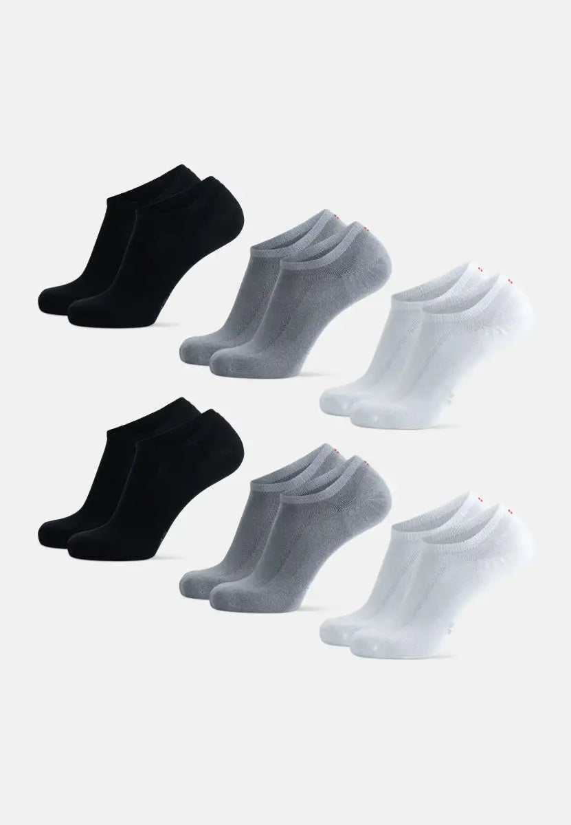 Three pairs of bamboo no-show socks in black, gray, and white, arranged in rows on a light background.