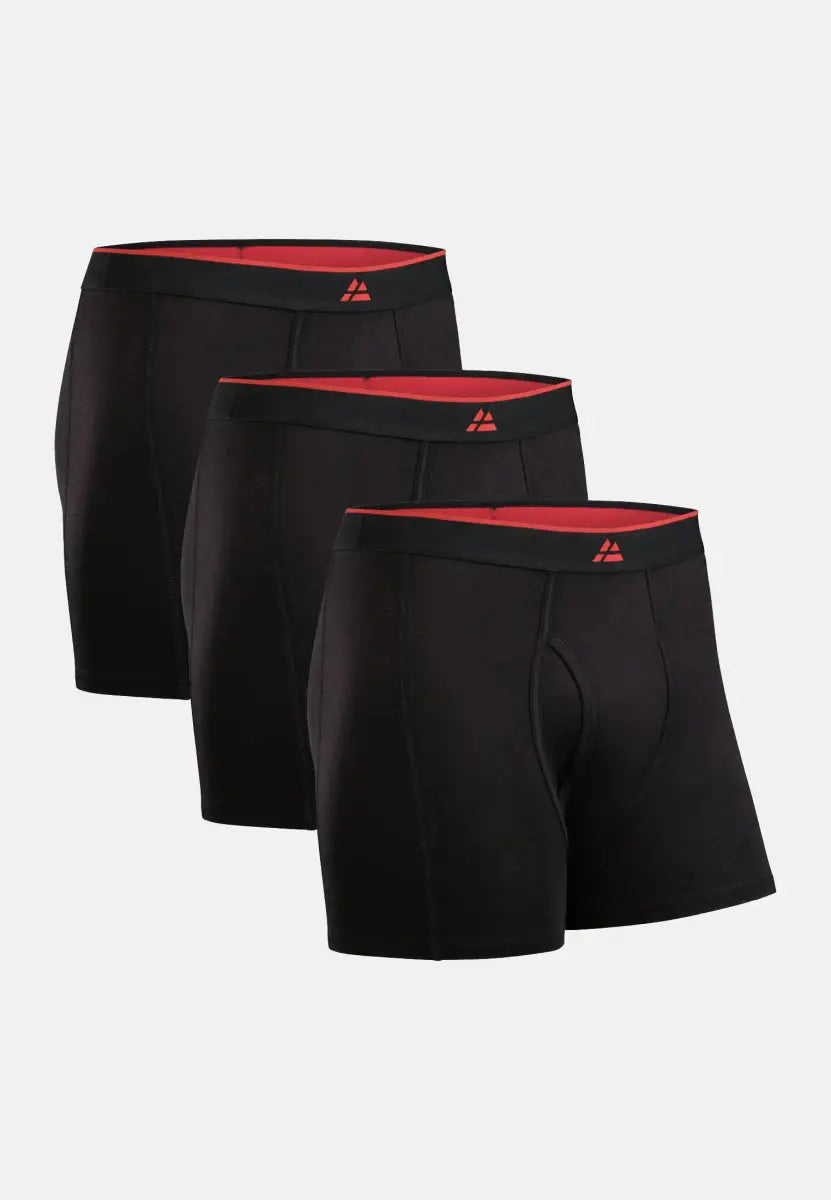 Three black bamboo trunks with red waistbands and fly, displayed against a light background.