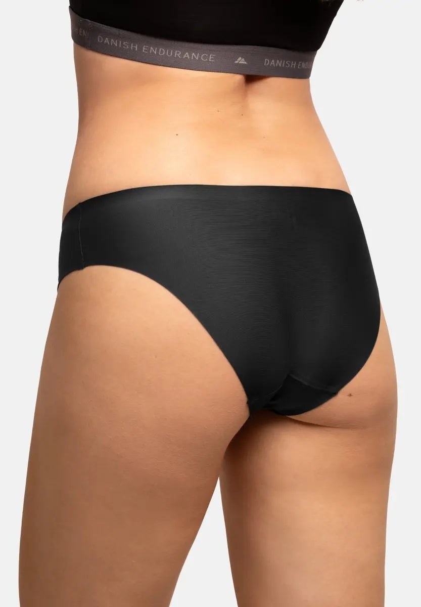 Back view of black seamless bikini panties with "DANISH ENDURANCE" waistband, showcasing fit and style.