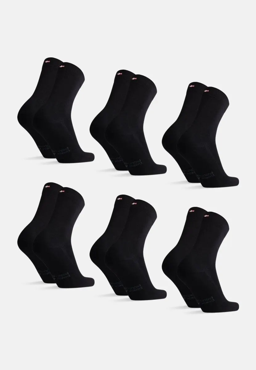 Six pairs of black kids' bamboo dress socks arranged in two rows, standing upright.
