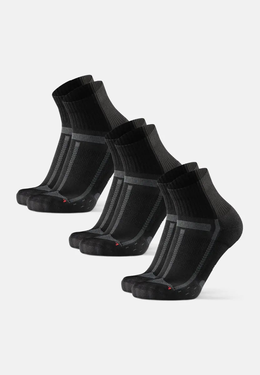 Four pairs of black kids' running socks with gray lines and ribbed cuffs, displayed in a row.