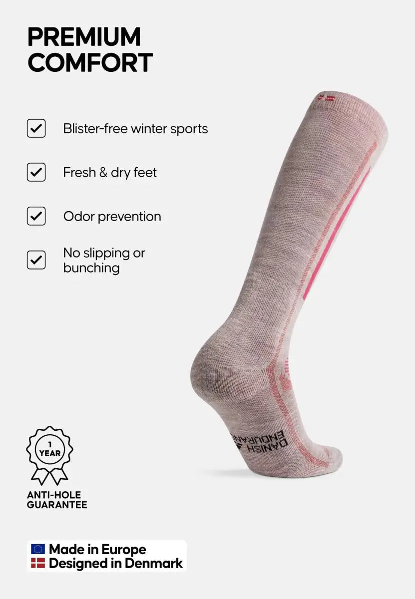 Knee-high merino wool ski sock with comfort features; blister-free, odor control, made in Europe.