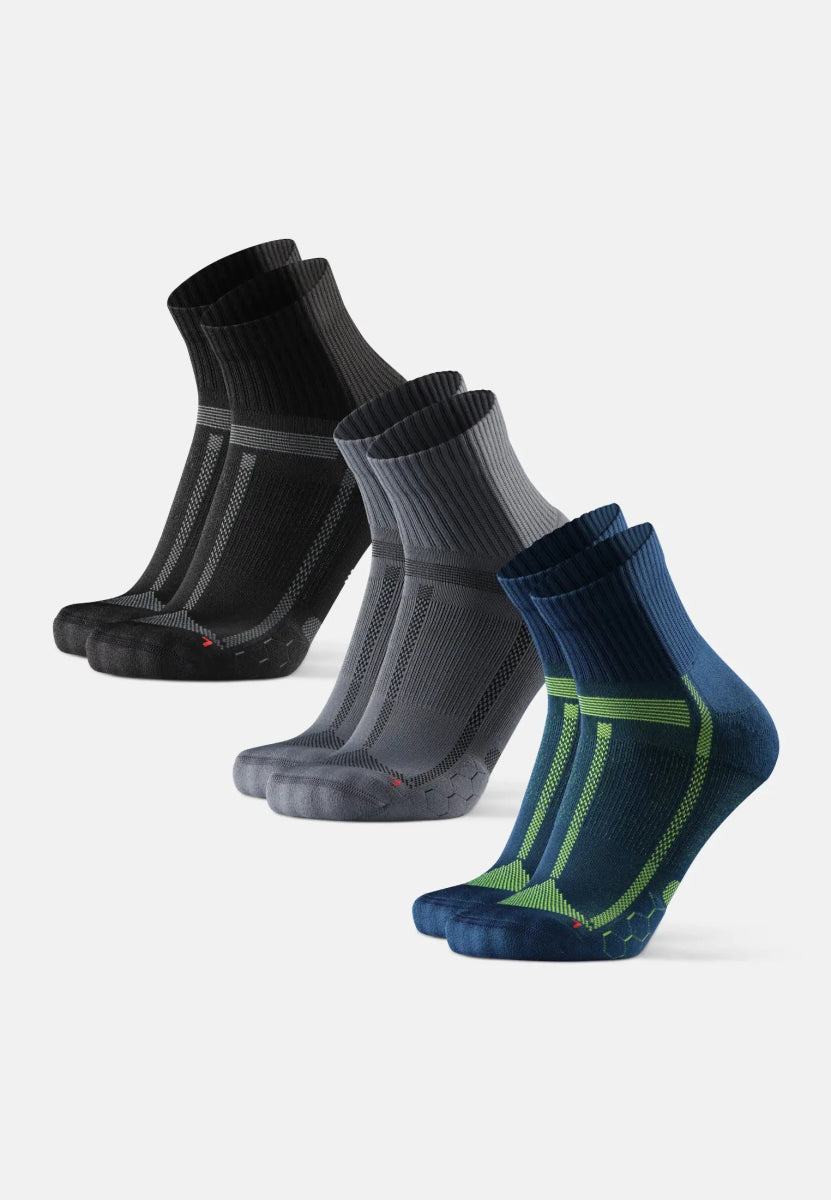 Three pairs of long-distance running socks in black, gray, and blue with green accents.