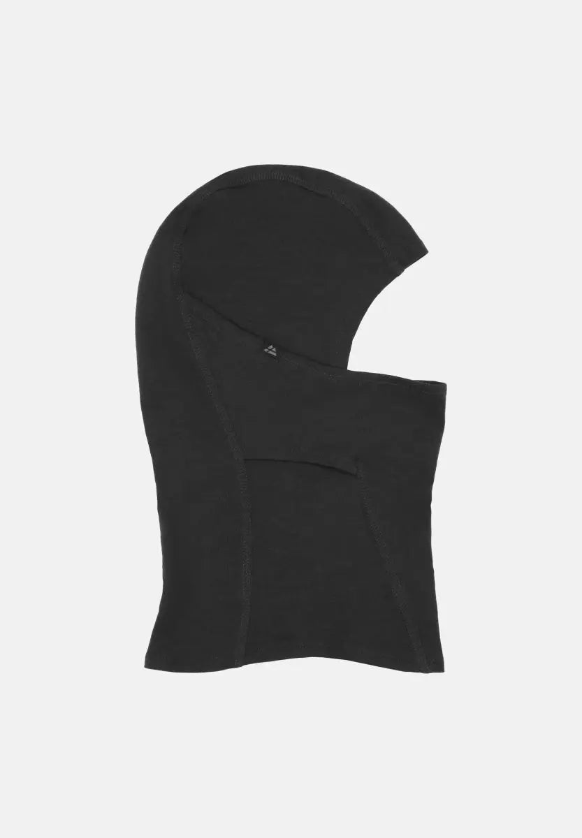 Black merino wool balaclava, side view, showing seams and smooth fabric texture.