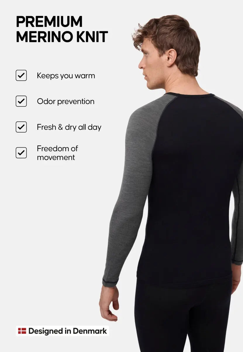 Man in a black and gray shirt with benefits listed: warmth, odor prevention, freshness, movement.