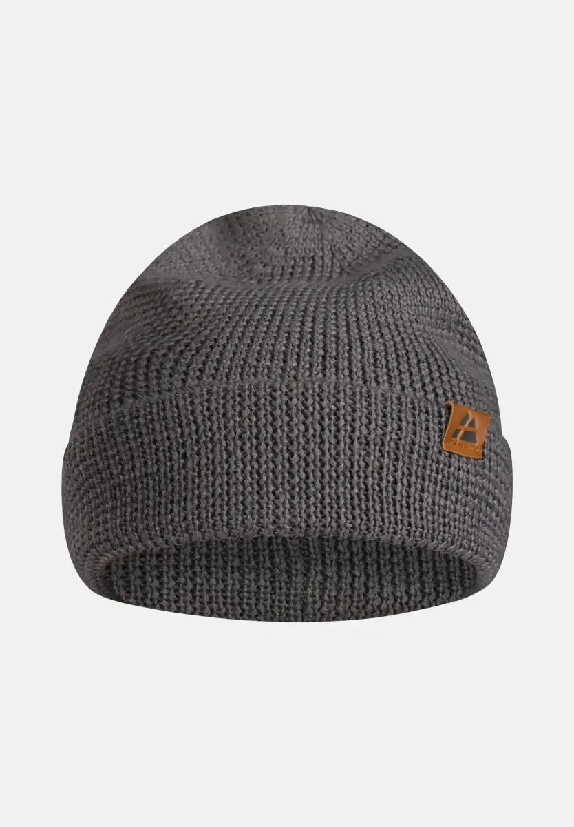 Gray knitted beanie with folded brim and brown leather patch on the side.