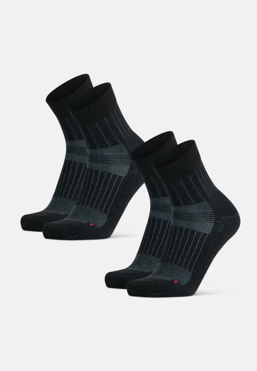 Two pairs of black merino wool running socks with ribbed texture and gray accents.