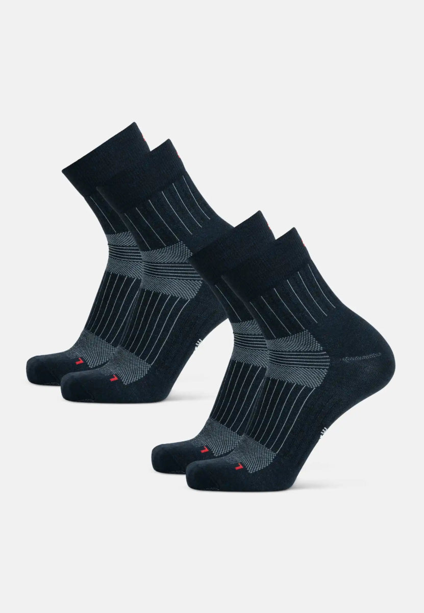 Two pairs of black Merino wool running socks with gray stripes and red accents.