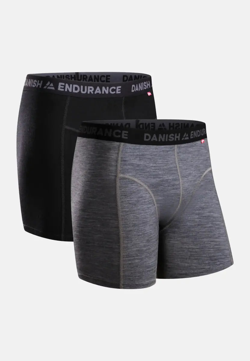 Two pairs of men's trunks, black and gray, with "Danish Endurance" on the waistband.
