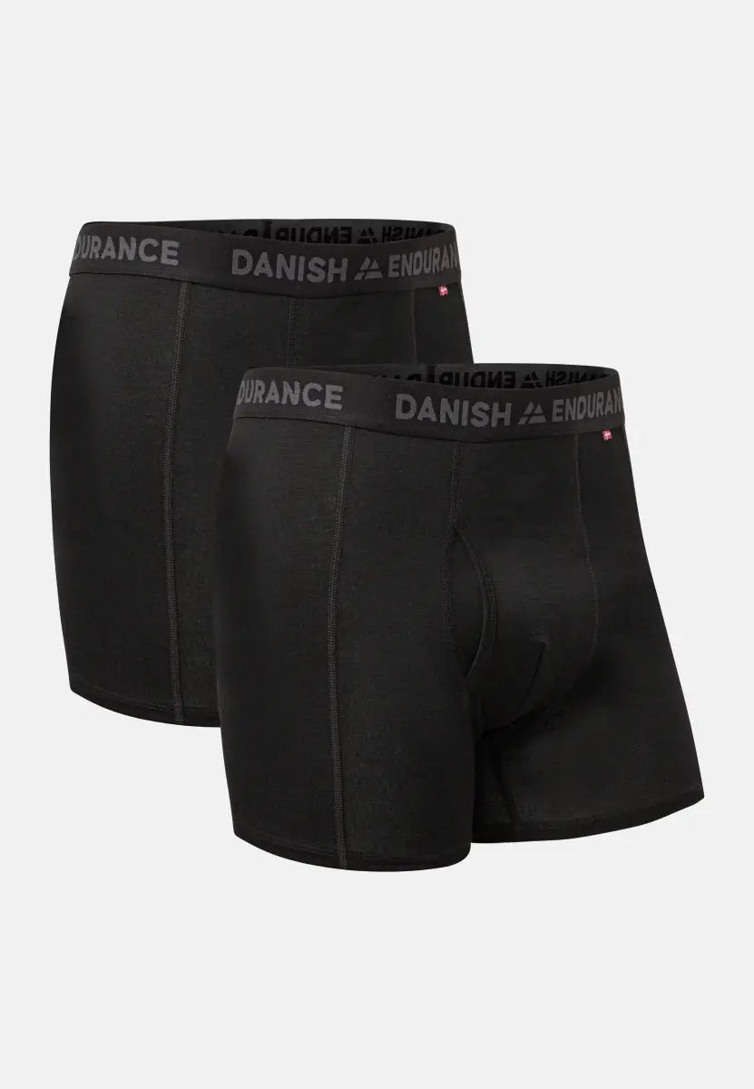 Two black men's merino wool trunks with fly, featuring "Danish Endurance" branded waistband.