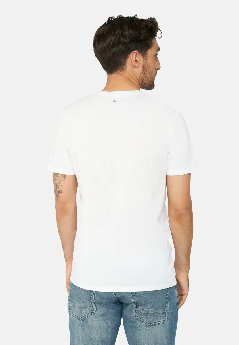 Back view of a man in a white T-shirt and blue jeans, showing a small logo on the shirt.
