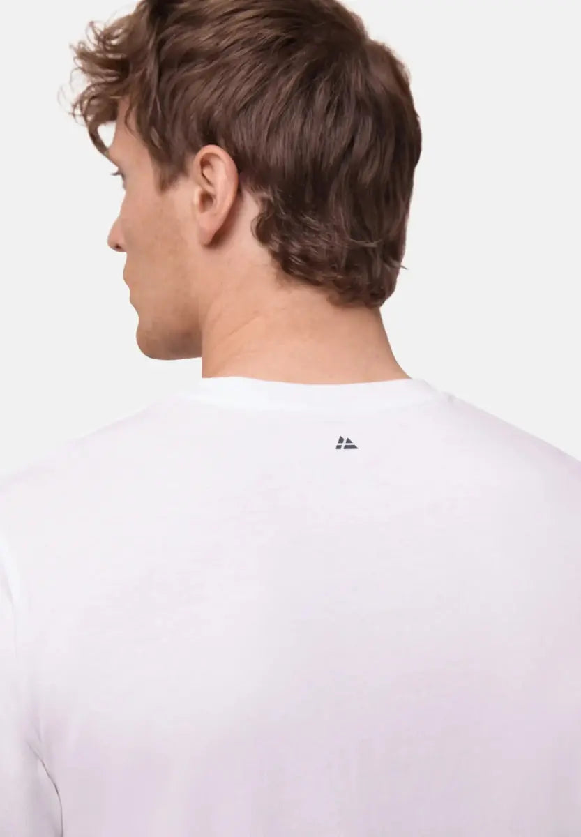 Back view of a man wearing a white V-neck T-shirt with a small logo near the neckline.