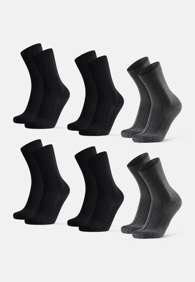 Six pairs of black and gray organic cotton dress socks, arranged in two rows.