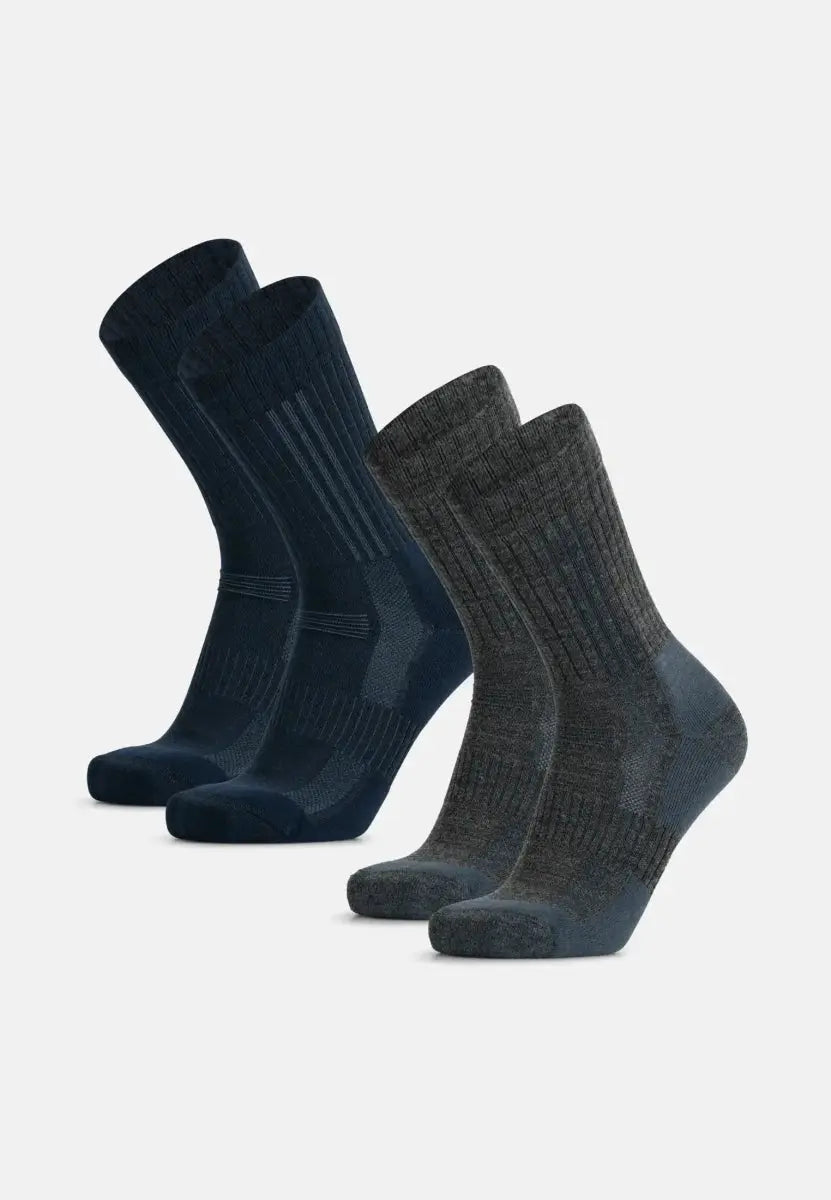 Two pairs of premium hiking socks, one dark blue and one dark gray, displayed on a plain background.