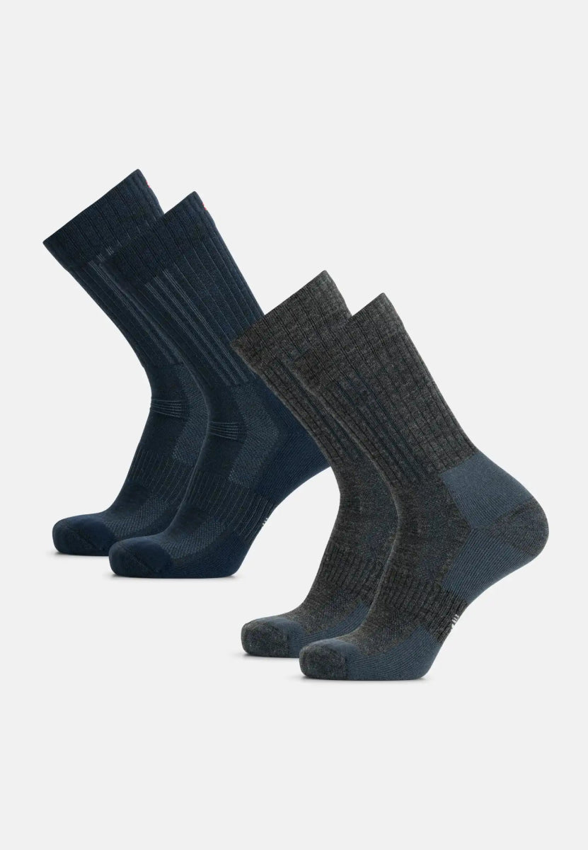 Two pairs of ribbed hiking socks, one dark blue and one dark gray, side by side on a plain background.