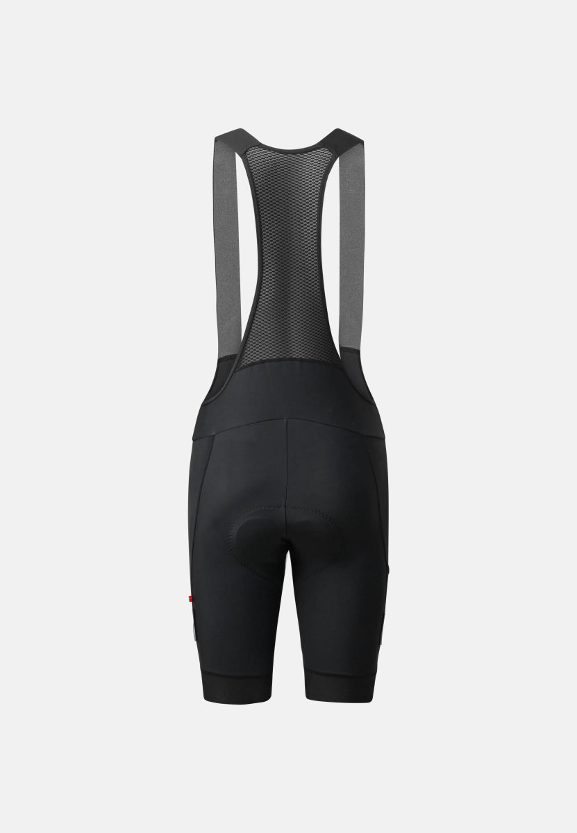 Back view of black cycling bib shorts with mesh straps and seat padding for men.