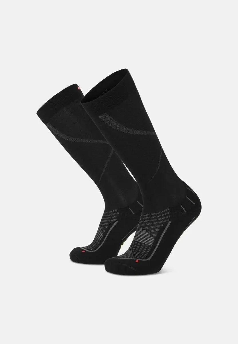 Black knee-high compression socks with gray patterns and ribbed texture, designed for sports.