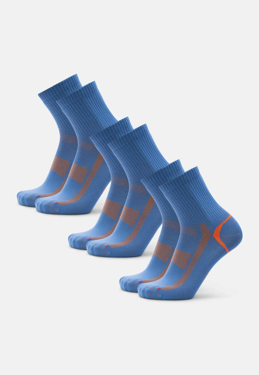 Five pairs of blue sports socks with brown stripes, arranged diagonally on a white background.
