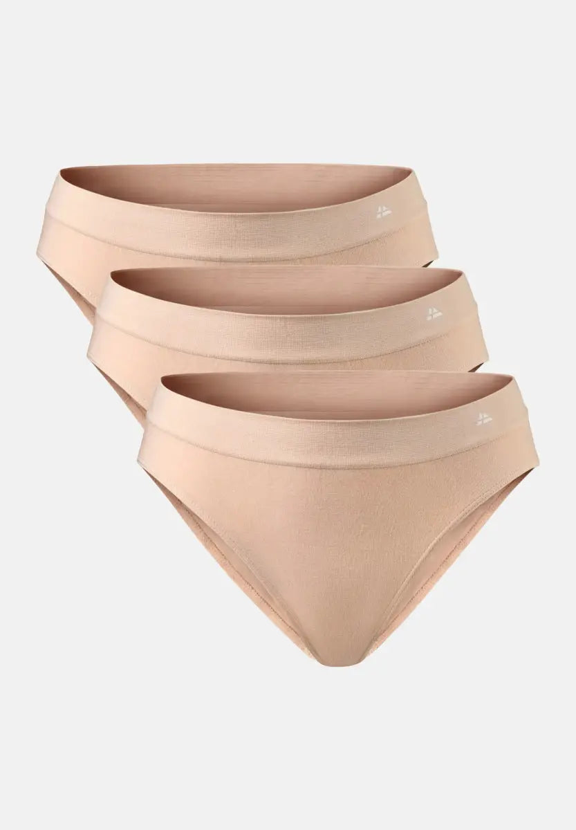 Three nude seamless bamboo bikinis, stacked and slightly overlapping, on a plain background.