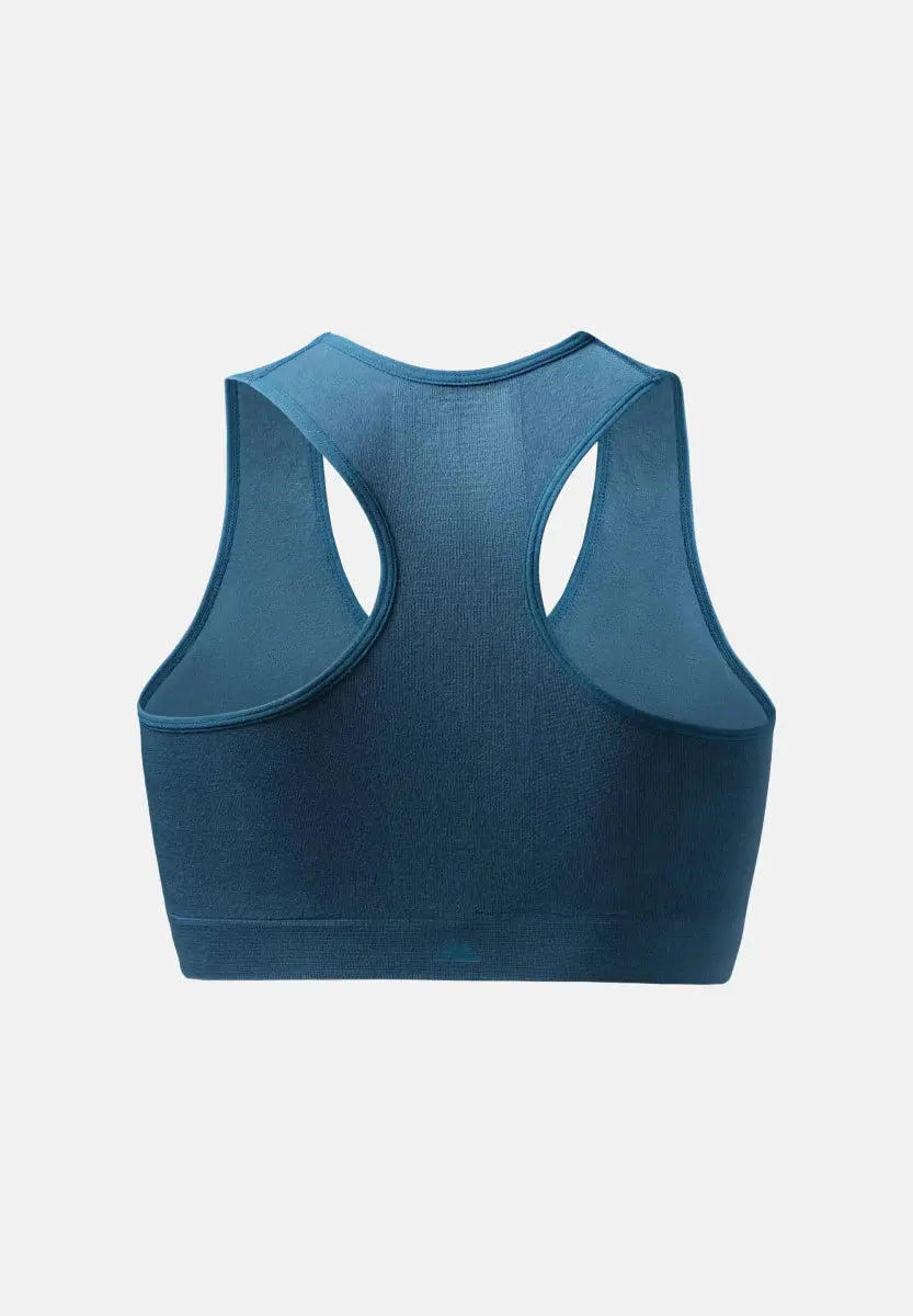 Back view of a teal seamless bamboo bralette with a racerback style.