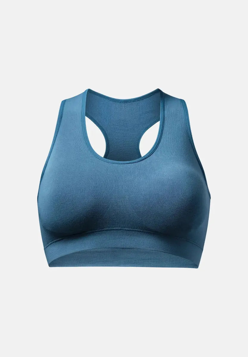 Seamless blue bamboo bralette with a racerback design on a plain background.