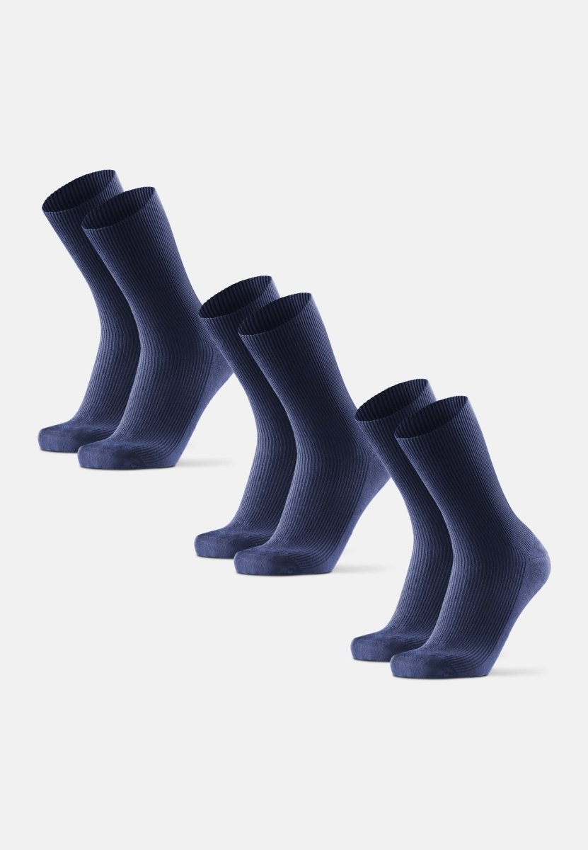 Six pairs of navy blue crew socks arranged in two rows on a white background.