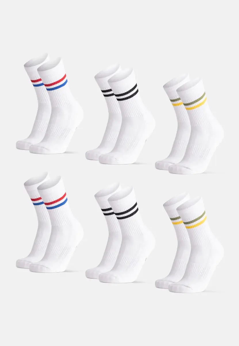 Three pairs of white socks with stripes: red/blue, black, and yellow/green.