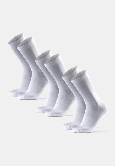 Five pairs of white cycling socks, aligned on a light grey background.